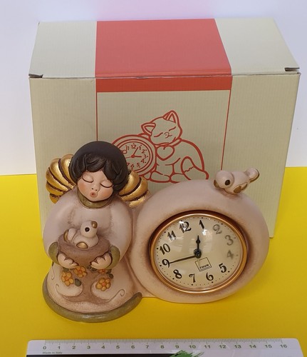 Angelo orologio con uccellino - angelo,