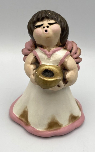 Statuina angelo cantante